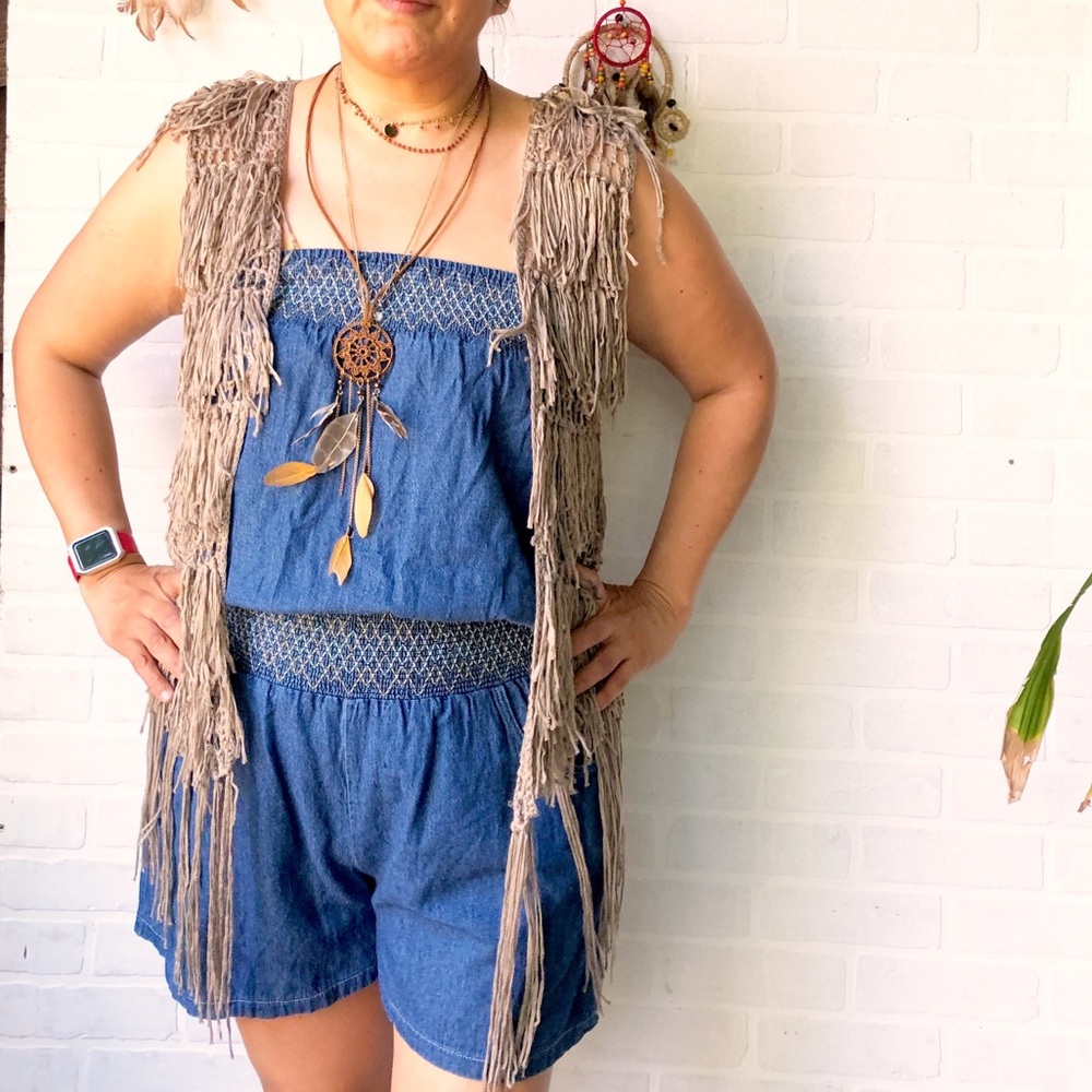 This vest features a gypsy look, very cute!